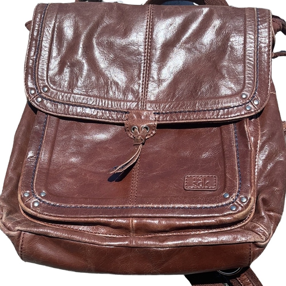 The Sak brown leather backpack purse
